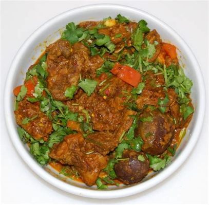  Karahi Gosht: Uma explosão de especiarias picantes em um ensopado de cordeiro cremoso e suculento!